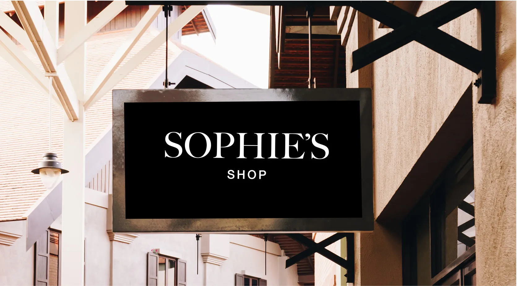 Sophie's Shop sign outside a building, relevant to quality management case studies.