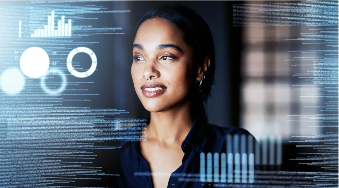 Woman looking at digital data streams, symbolizing digital transformation in supply chains.