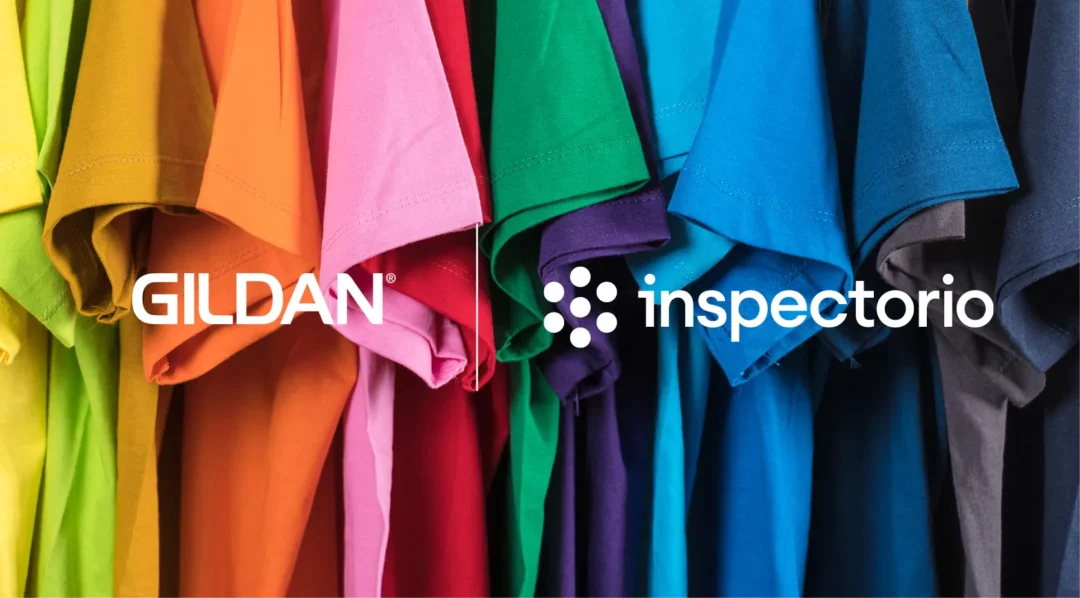 Gildan and Inspectorio logos on a backdrop of colorful t-shirts.