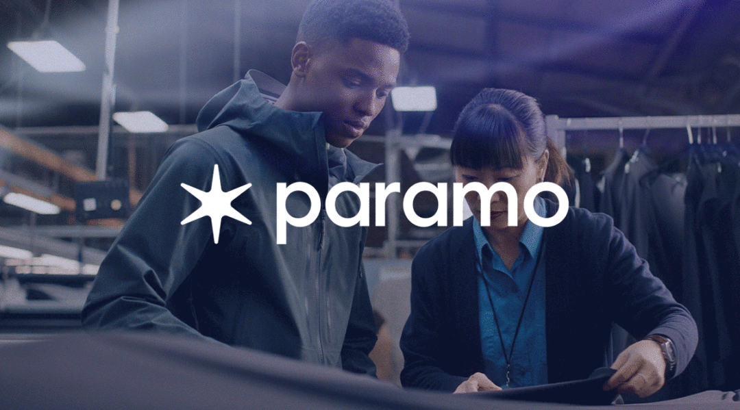 Paramo logo over two people examining fabric in a warehouse setting
