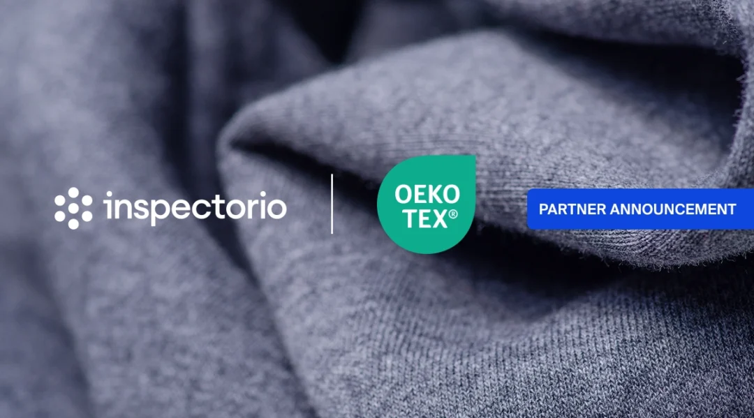 Inspectorio and OEKO-TEX® partner announcement banner over a blurred gray knit fabric background.